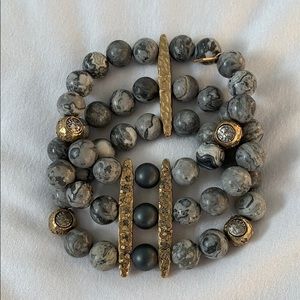 Tat2 Triple Stretch Bracelet. Very Unusual